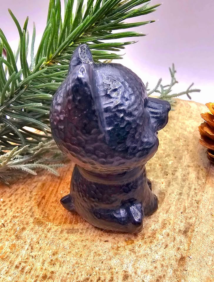 Black obsidian carved cheerful dog decor figure top view — My Aura Gemstones