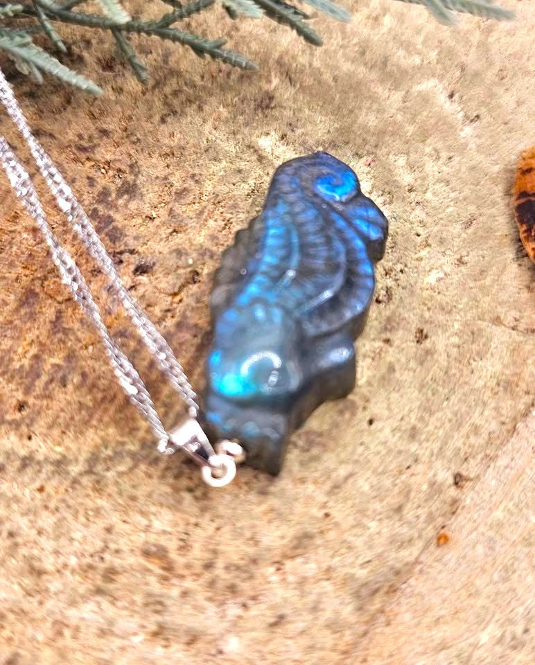 Labradorite carved flashy seahorse pendant necklace flash close-up — My Aura Gemstones
