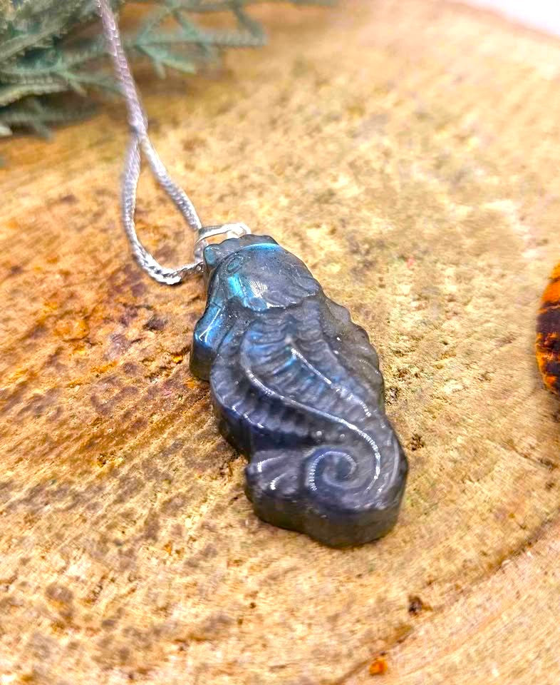 Labradorite carved flashy seahorse pendant necklace flash close-up — My Aura Gemstones