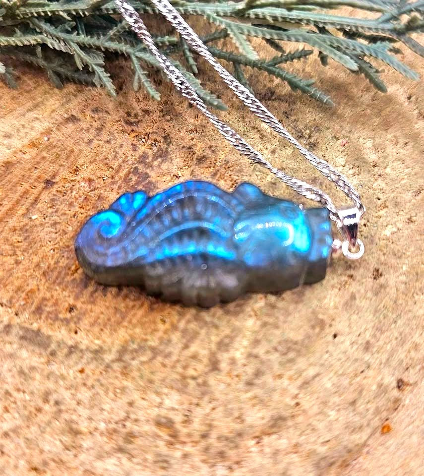 Labradorite carved flashy seahorse pendant necklace flash close-up — My Aura Gemstones