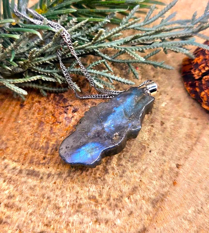 Labradorite carved flashy seahorse pendant necklace flash close-up — My Aura Gemstones