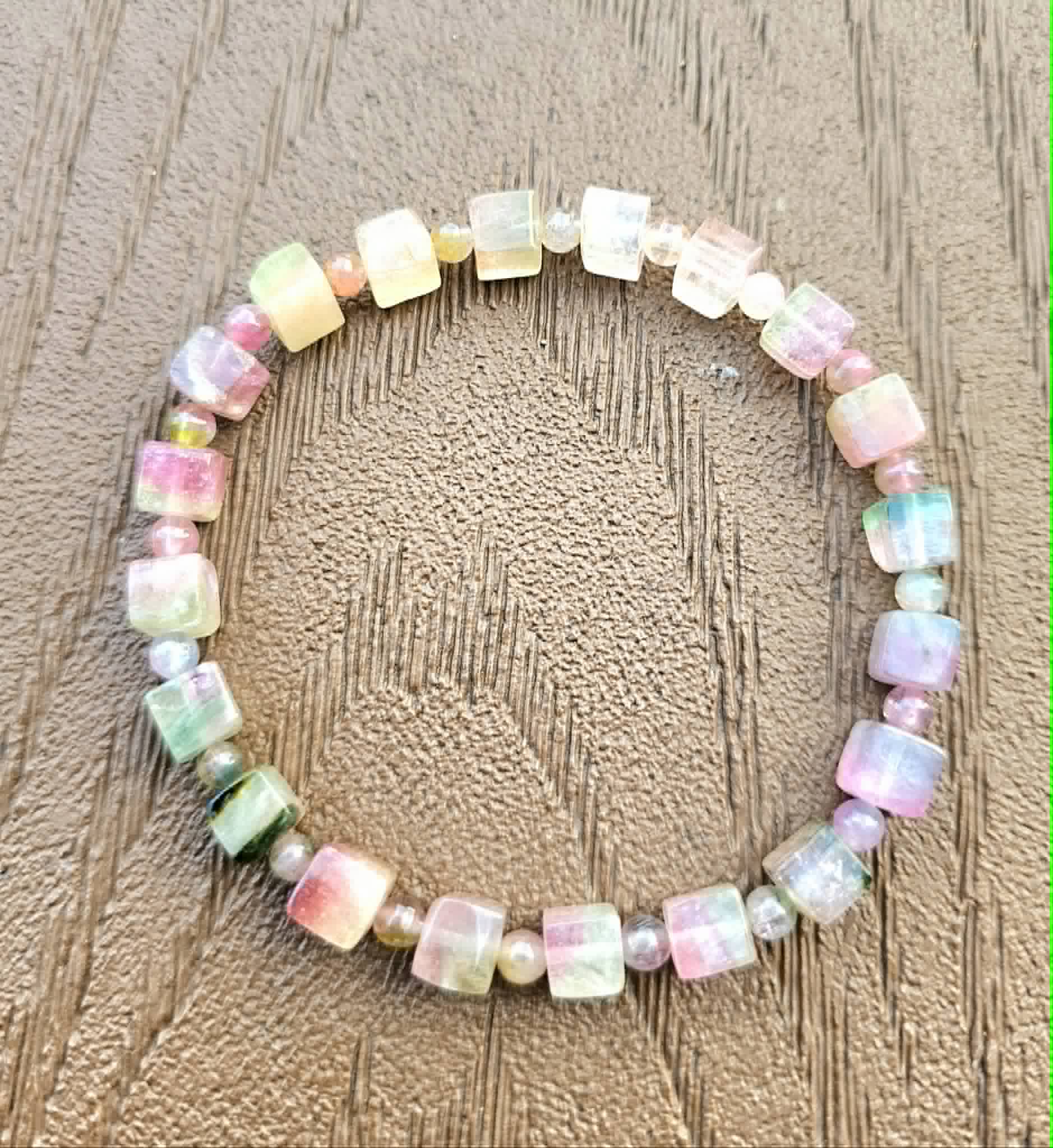 Premium grade watermelon tourmaline crystal cube bracelet bead close-up — My Aura Gemstones
