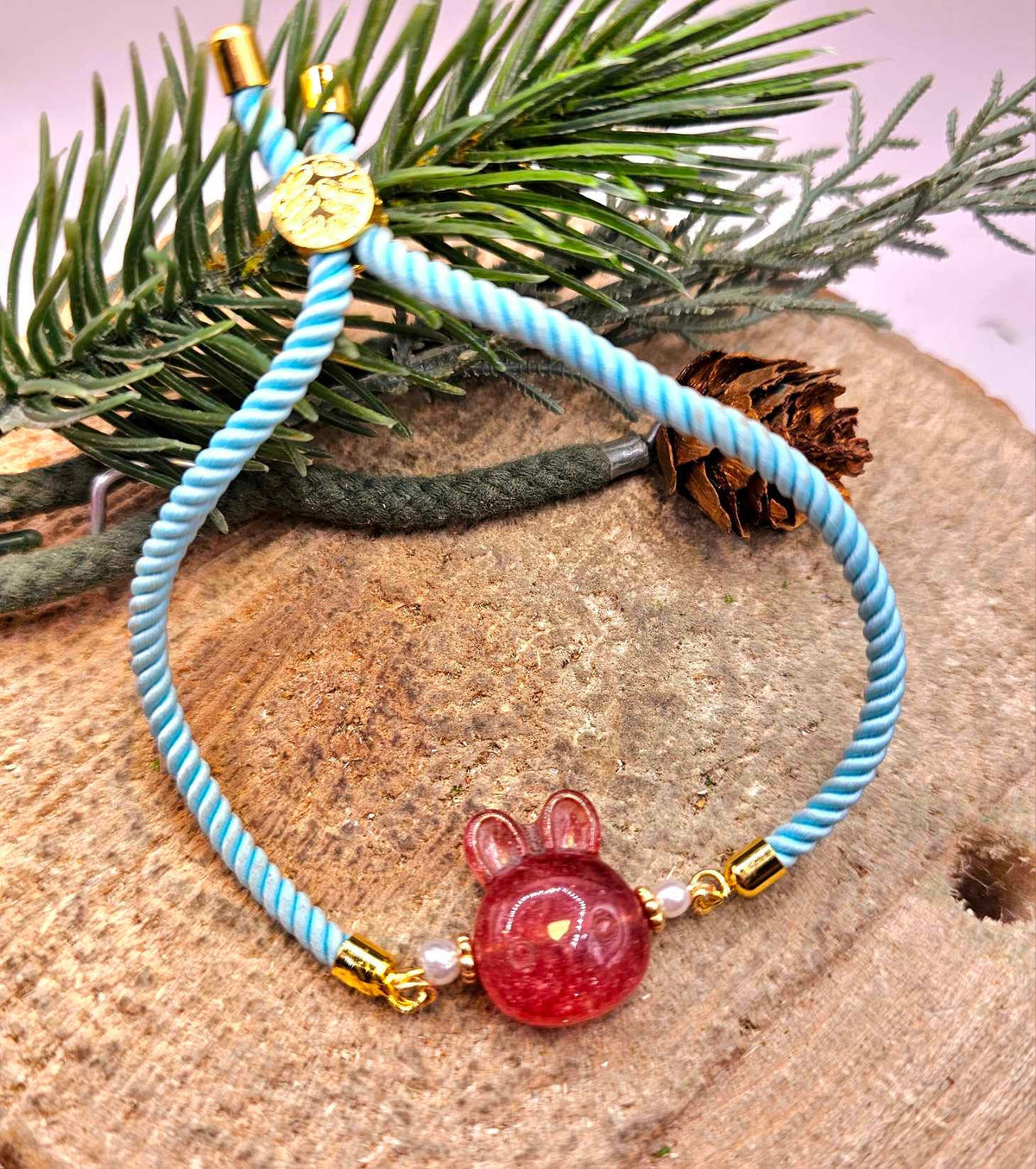Crystal wood rabbit head adjustable blue knitted bracelet clasp detail — My Aura Gemstones