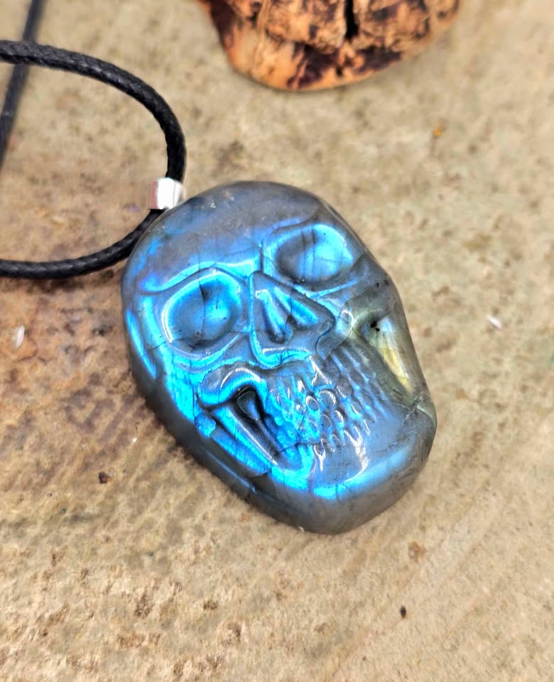 Labradorite flashy skull pendant necklace worn view — My Aura Gemstones