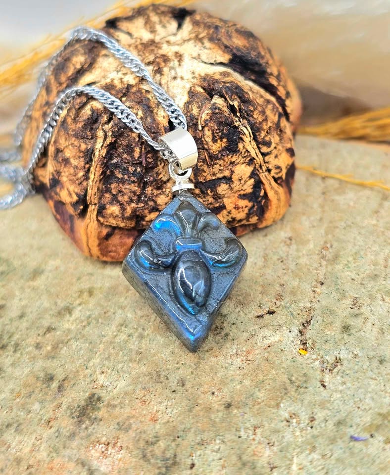 Labradorite carved fleur-de-lis symbol tile pendant necklace close-up — My Aura Gemstones