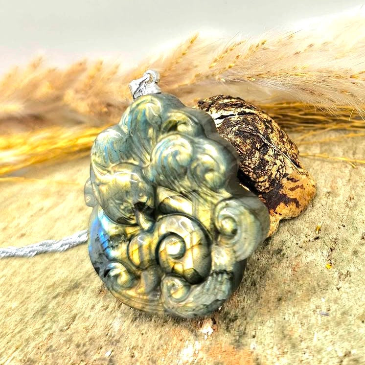Labradorite carved elegant nine tails fox looking back pendant lifestyle view — My Aura Gemstones