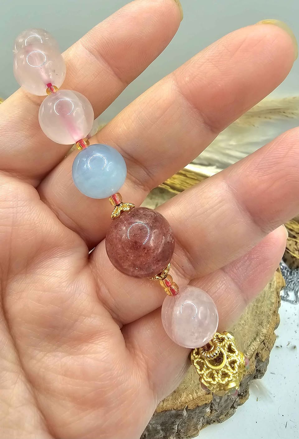 Mixed crystal and tourmaline blessing wheel bracelet worn on wrist — My Aura Gemstones