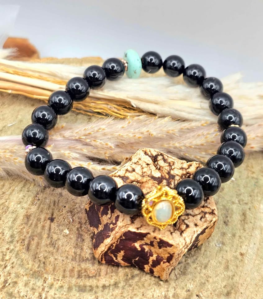 Black obsidian bracelet with turquoise donut and gold opal charm from the Protection & Grounding Duo - My Aura Gemstones