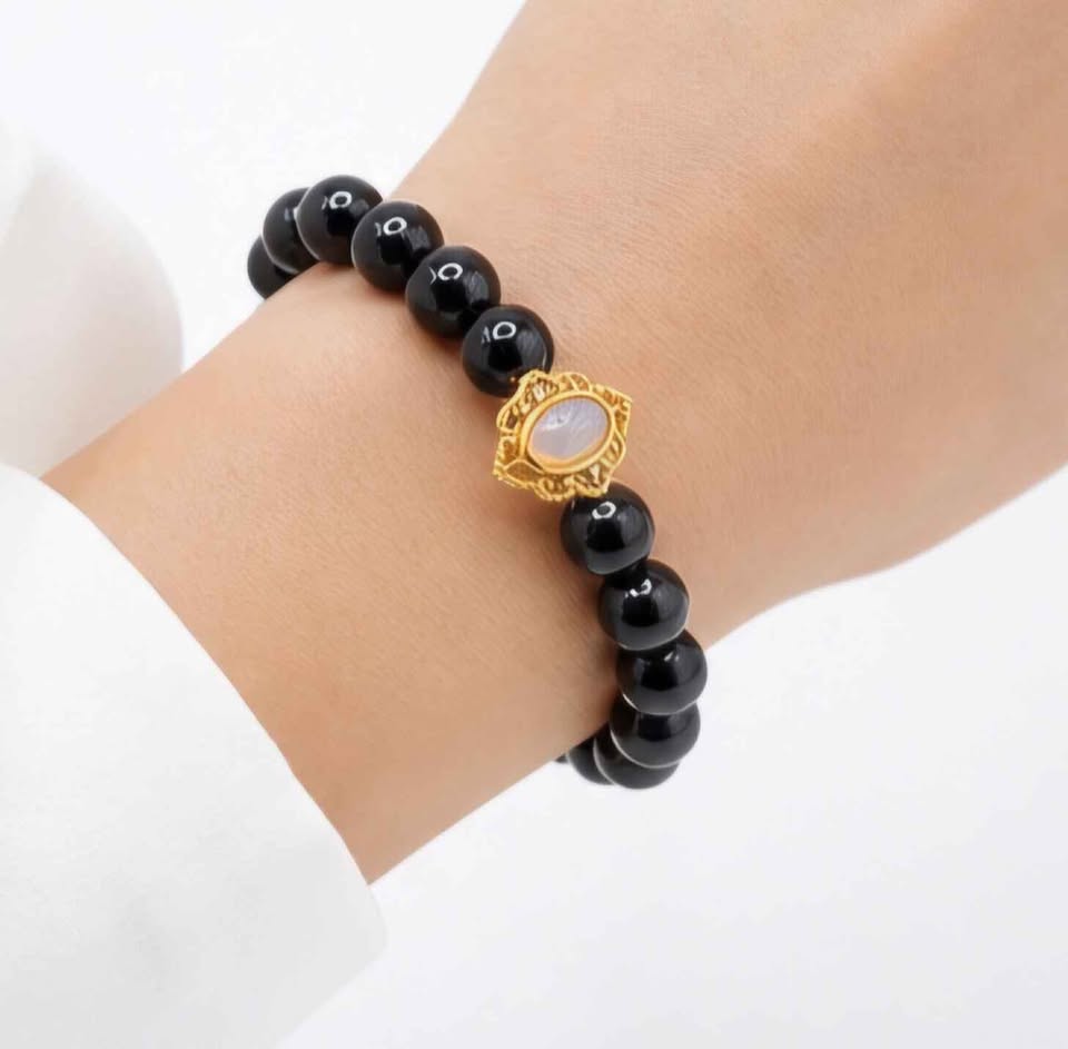 Black obsidian bracelet with turquoise donut and gold opal charm, 10mm natural crystal beads. My Aura Gemstones