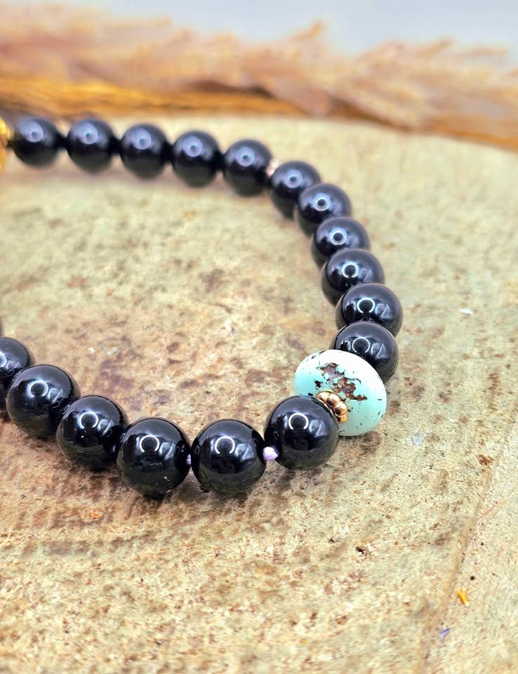 Black obsidian bracelet with turquoise donut and gold opal charm, 10mm natural crystal beads. My Aura Gemstones