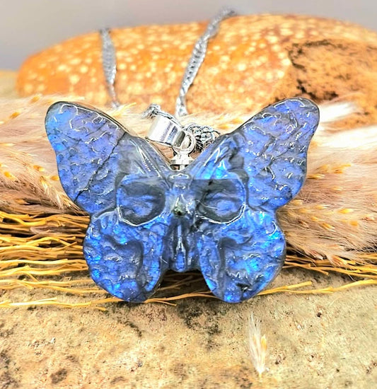 Labradorite carved hidden skull butterfly pendant necklace flash close-up — My Aura Gemstones