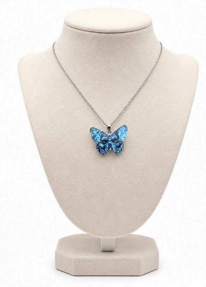 Labradorite carved hidden skull butterfly pendant necklace flash close-up — My Aura Gemstones