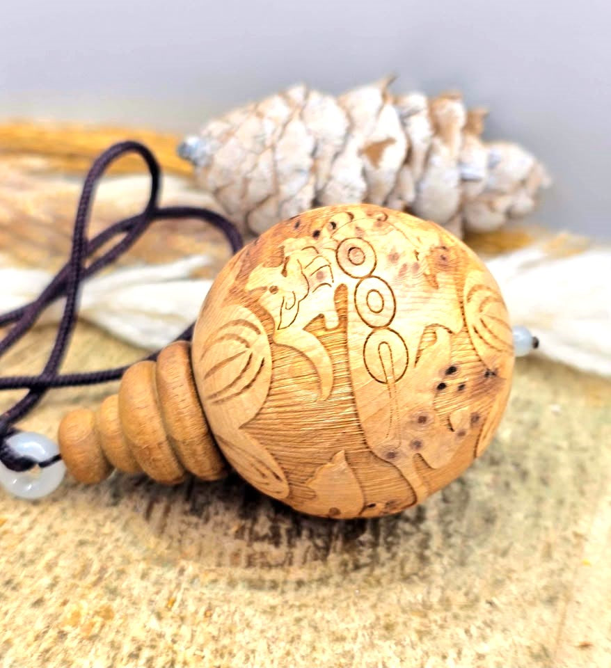 Jumbo natural wood Feng Shui pendant with Pi Xiu, lotus, and wealth coin carvings on adjustable braided necklace - My Aura Gemstones
