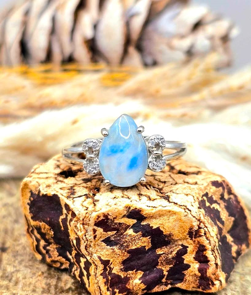 Natural translucent blue kyanite teardrop ring with clear quartz mix and adjustable rhinestone‑stacked band. My Aura Gemstones