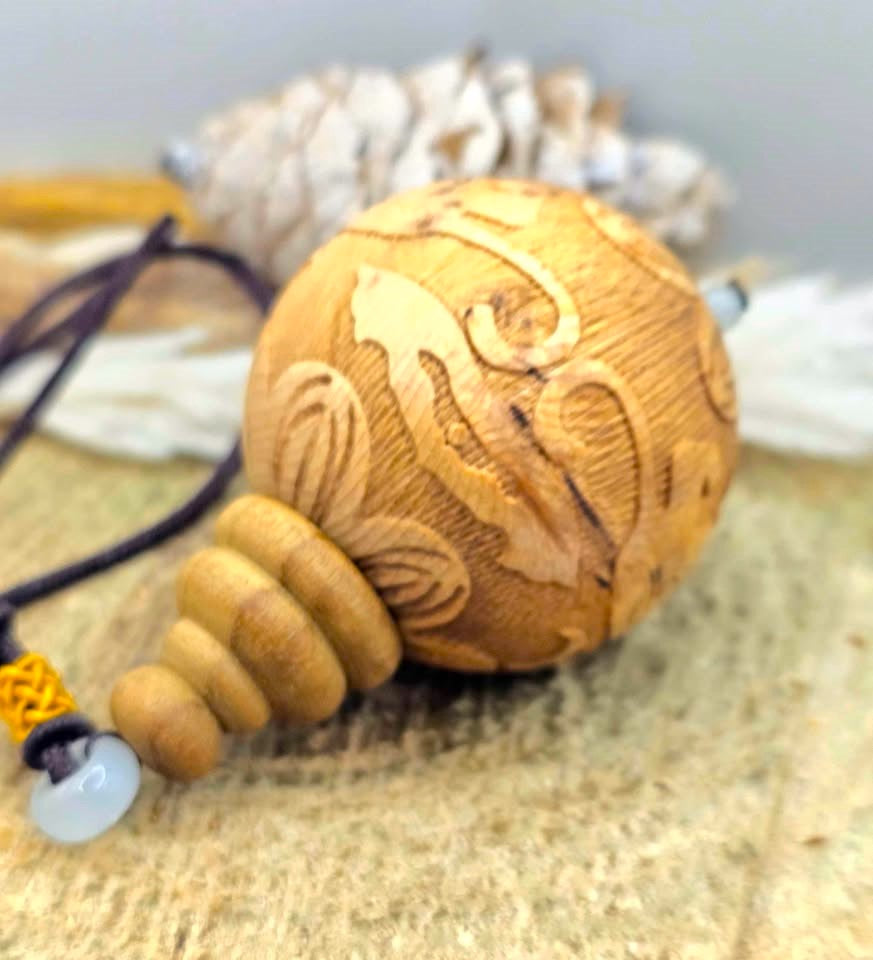 Jumbo natural wood Feng Shui pendant with Pi Xiu, lotus, and wealth coin carvings on adjustable braided necklace - My Aura Gemstones
