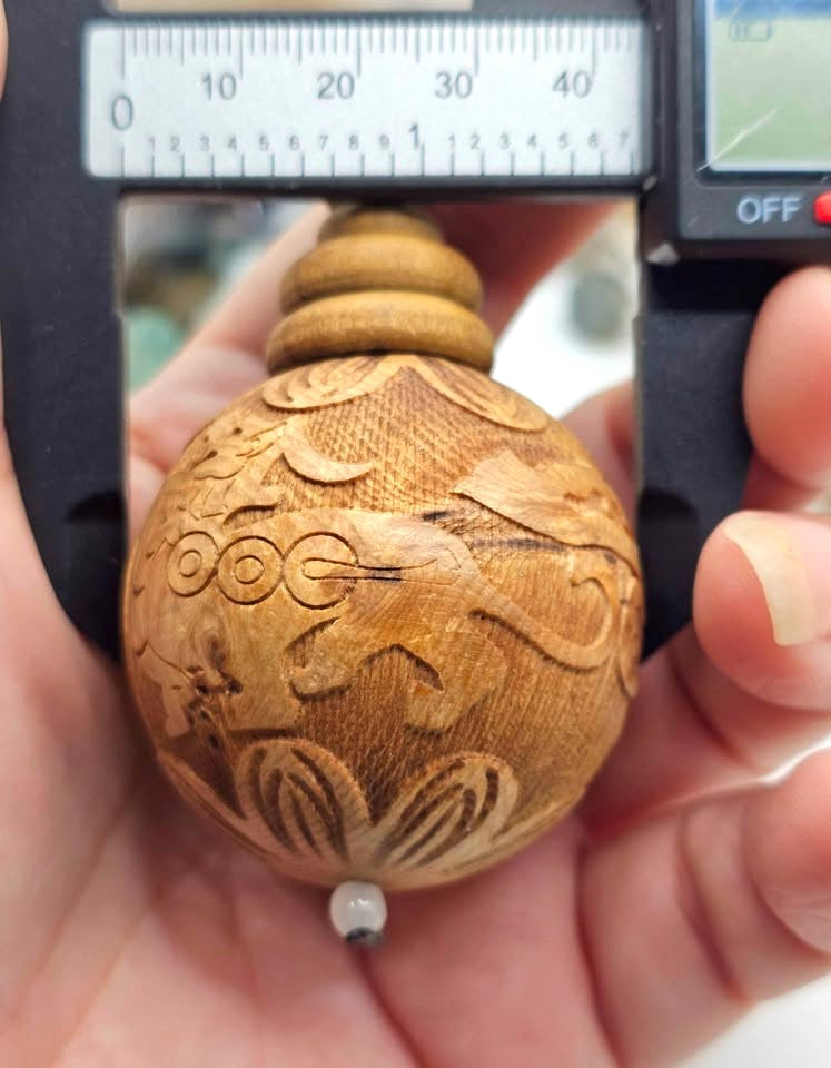 Jumbo natural wood Feng Shui pendant with Pi Xiu, lotus, and wealth coin carvings on adjustable braided necklace - My Aura Gemstones