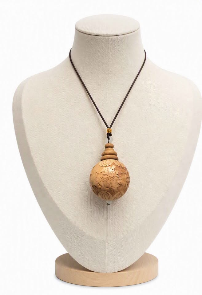 Jumbo natural wood Feng Shui pendant with Pi Xiu, lotus, and wealth coin carvings on adjustable braided necklace - My Aura Gemstones