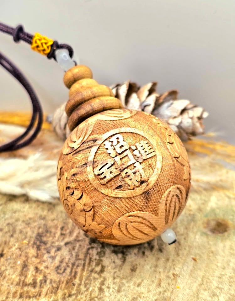 Jumbo natural wood Feng Shui pendant with Pi Xiu, lotus, and wealth coin carvings on adjustable braided necklace - My Aura Gemstones