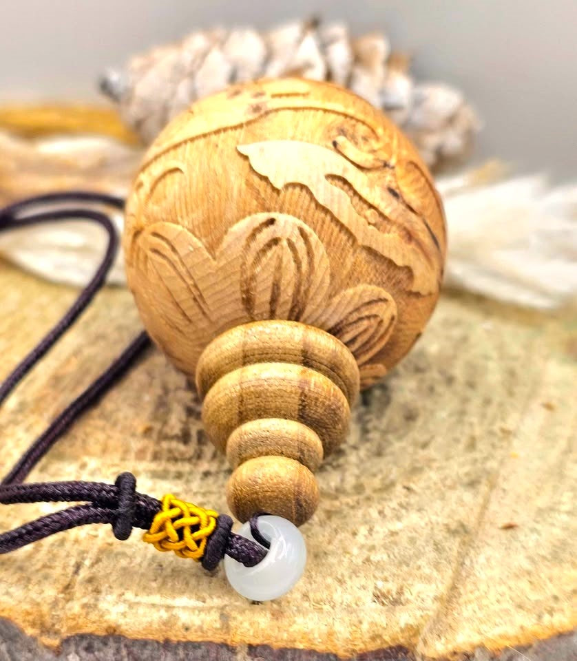 Jumbo natural wood Feng Shui pendant with Pi Xiu, lotus, and wealth coin carvings on adjustable braided necklace - My Aura Gemstones
