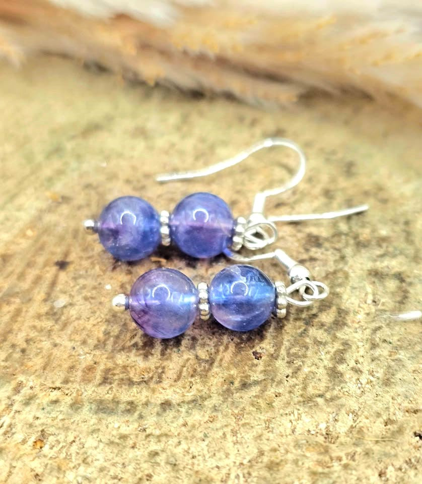 Handcrafted purple fluorite dangle earrings with 7mm lavender‑to‑violet beads, silver‑tone spacers, and S925 stamped fishhook ear wires.-My Aura Gemstones