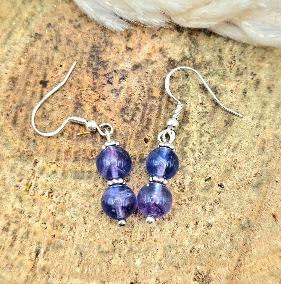 Handcrafted purple fluorite dangle earrings with 7mm lavender‑to‑violet beads, silver‑tone spacers, and S925 stamped fishhook ear wires.-My Aura Gemstones
