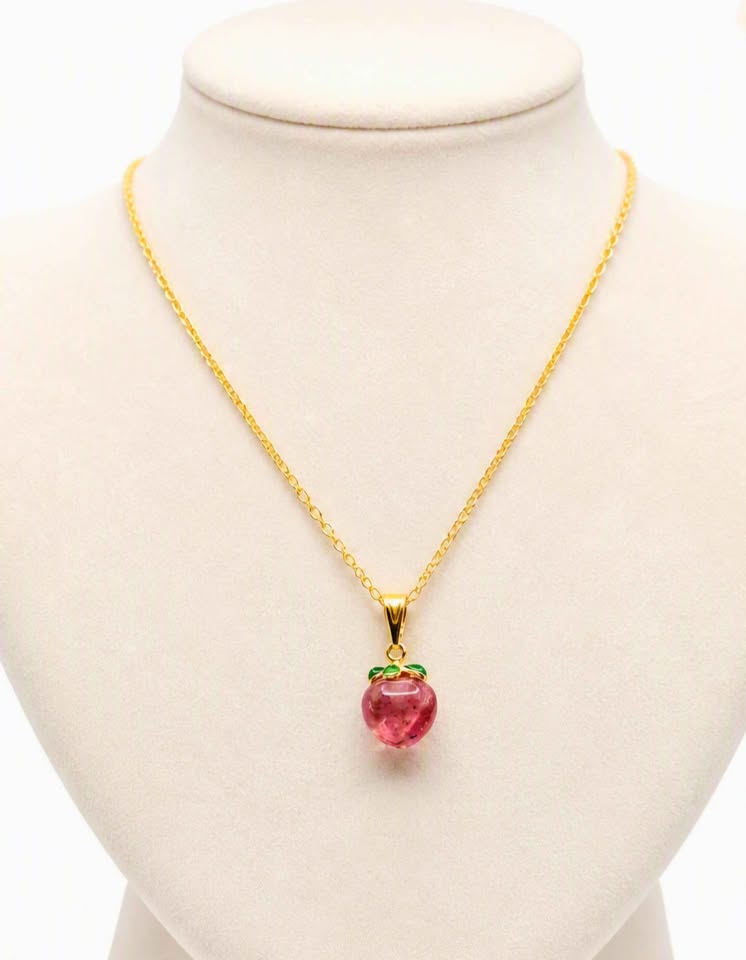 Mini peach pendant carved from natural strawberry quartz with metal leaf and matching gold chain, 18–20 inches-My Aura Gemstones