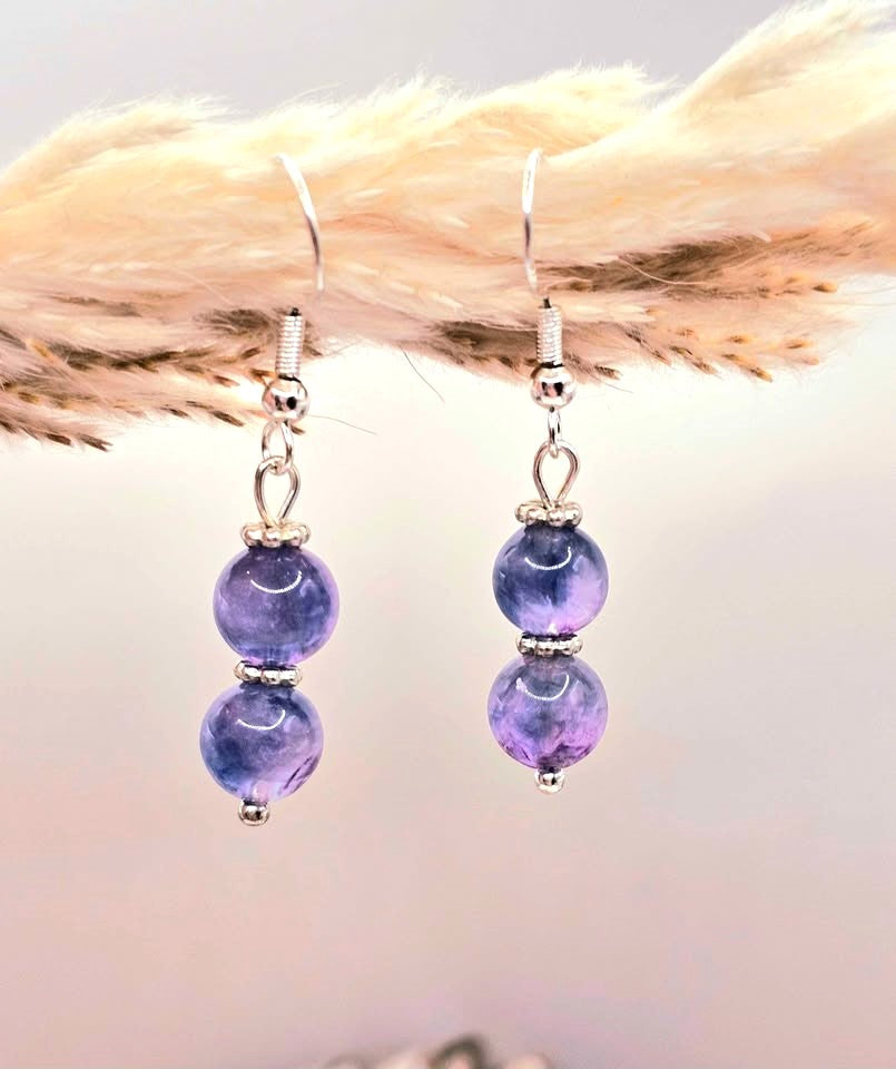 Handcrafted purple fluorite dangle earrings with 7mm lavender‑to‑violet beads, silver‑tone spacers, and S925 stamped fishhook ear wires.-My Aura Gemstones