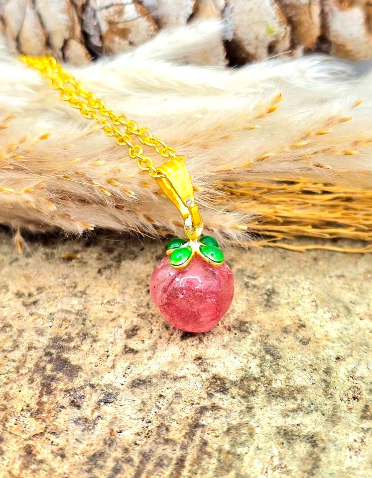 Mini peach pendant carved from natural strawberry quartz with metal leaf and matching gold chain, 18–20 inches-My Aura Gemstones
