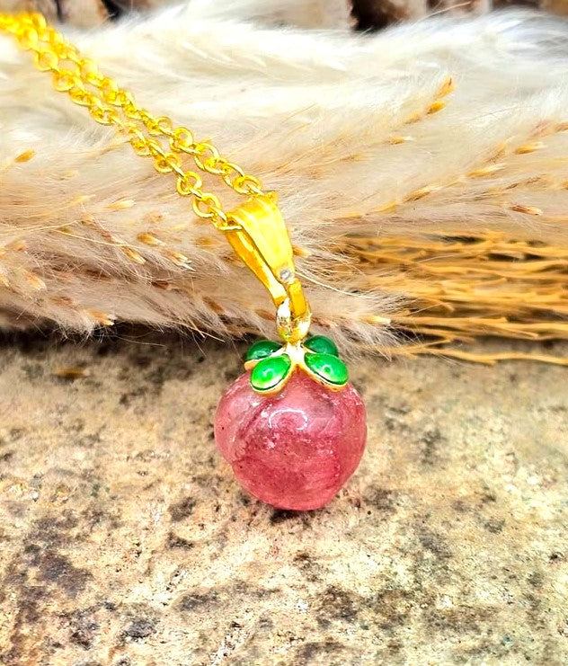 Mini peach pendant carved from natural strawberry quartz with metal leaf and matching gold chain, 18–20 inches-My Aura Gemstones