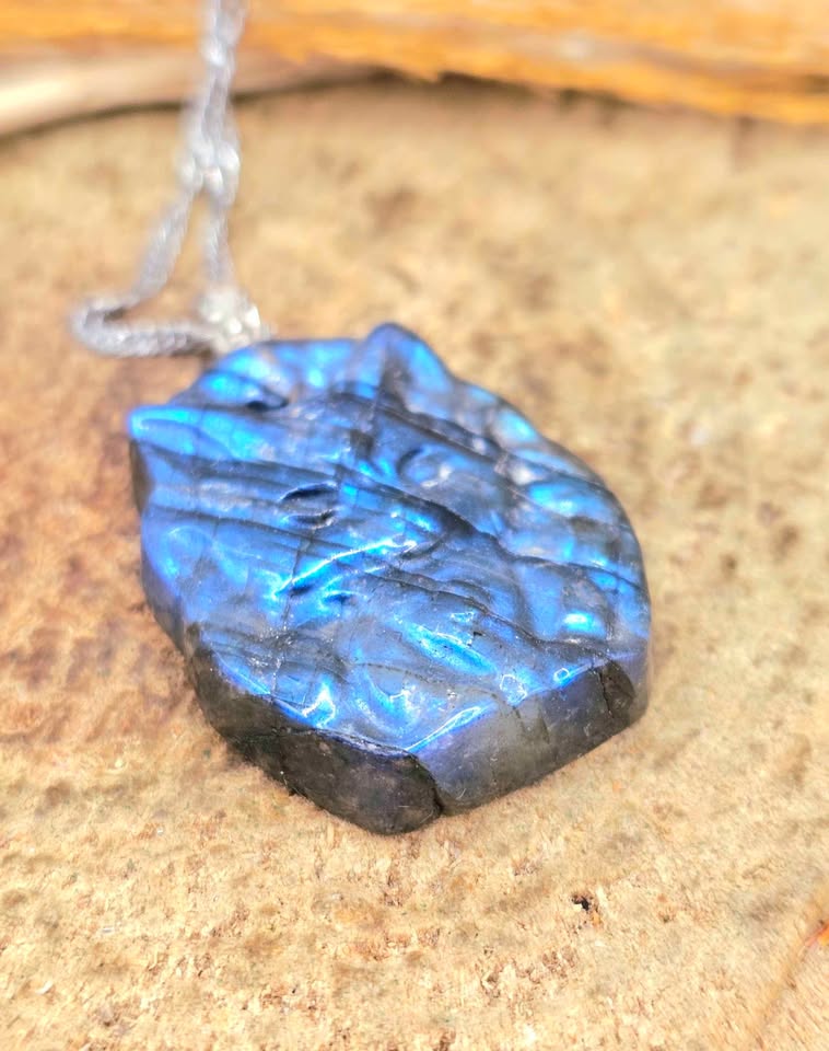 Labradorite carved sitting nine tails fox pendant necklace in natural light — My Aura Gemstones