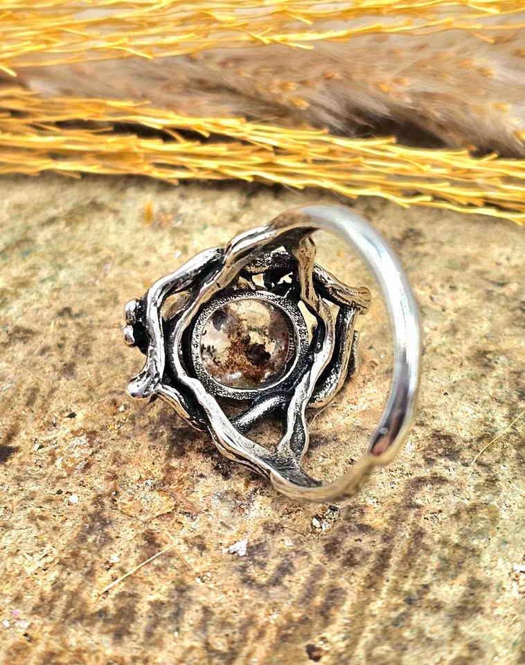 Garden quartz ring with high‑clarity crystal and green‑brown inclusions, floral wood‑branch band with butterfly, inner view adjustable size-My Aura Gemstones