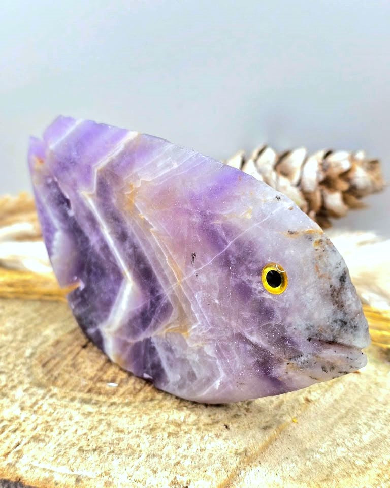 Hand‑carved Dream Amethyst fish figurine with chevron pattern and purple quartz, 4.1 inch crystal carving, front view-My Aura Gemstones
