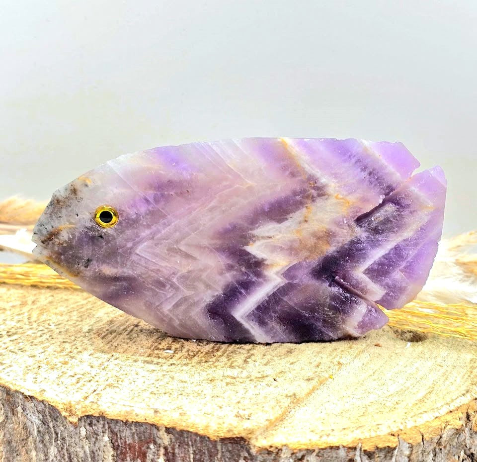 Hand‑carved Dream Amethyst fish figurine with chevron pattern and purple quartz, 4.1 inch crystal carving, back view-My Aura Gemstones