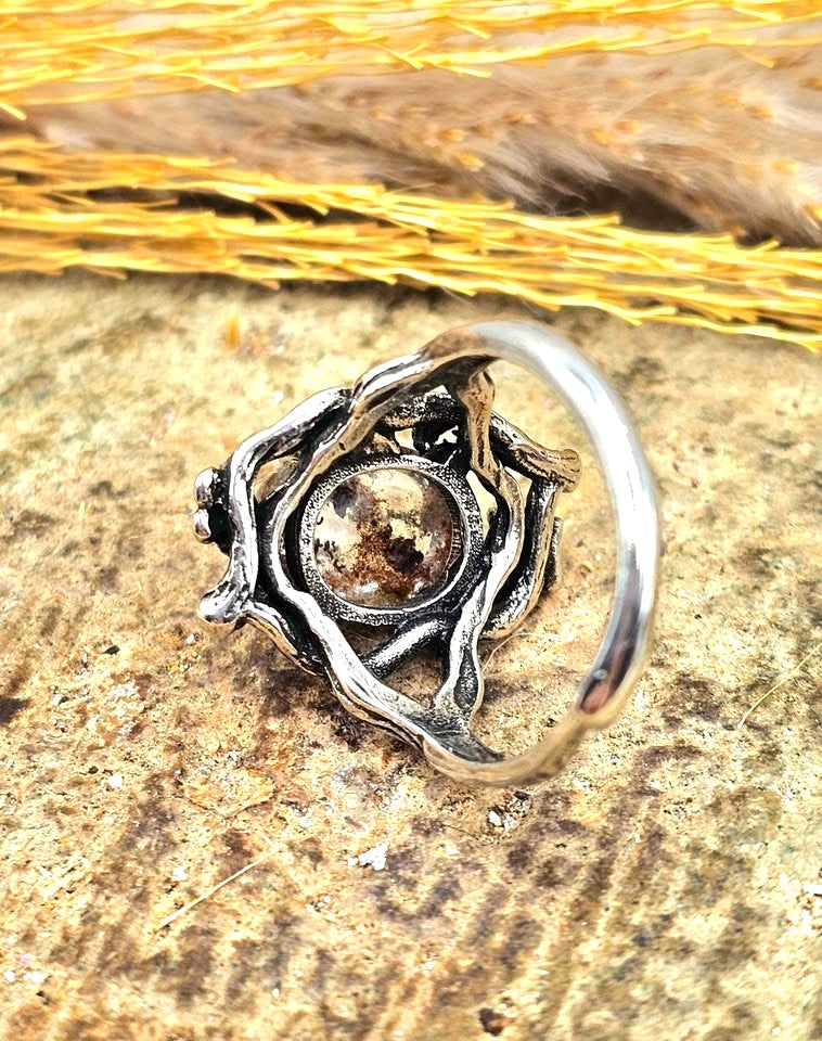 Garden quartz ring with high‑clarity crystal and green‑brown inclusions, floral wood‑branch band with butterfly, adjustable size, back view -My Aura Gemstones