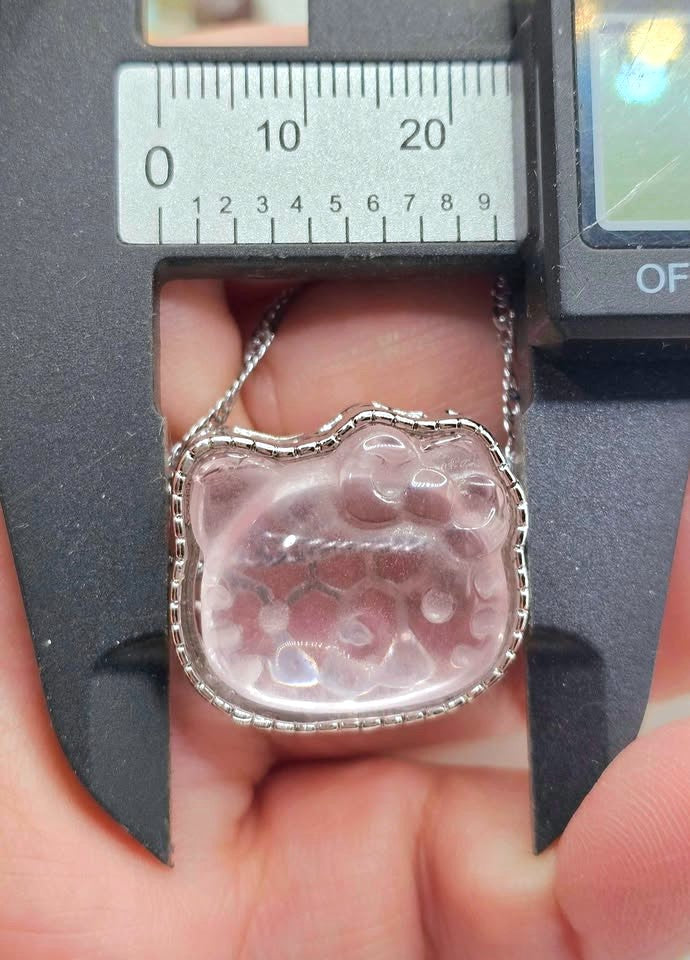 Natural rose quartz rose Hello Kitty charm with light pink transparent crystal and silver‑tone frame-My Aura Gemstones