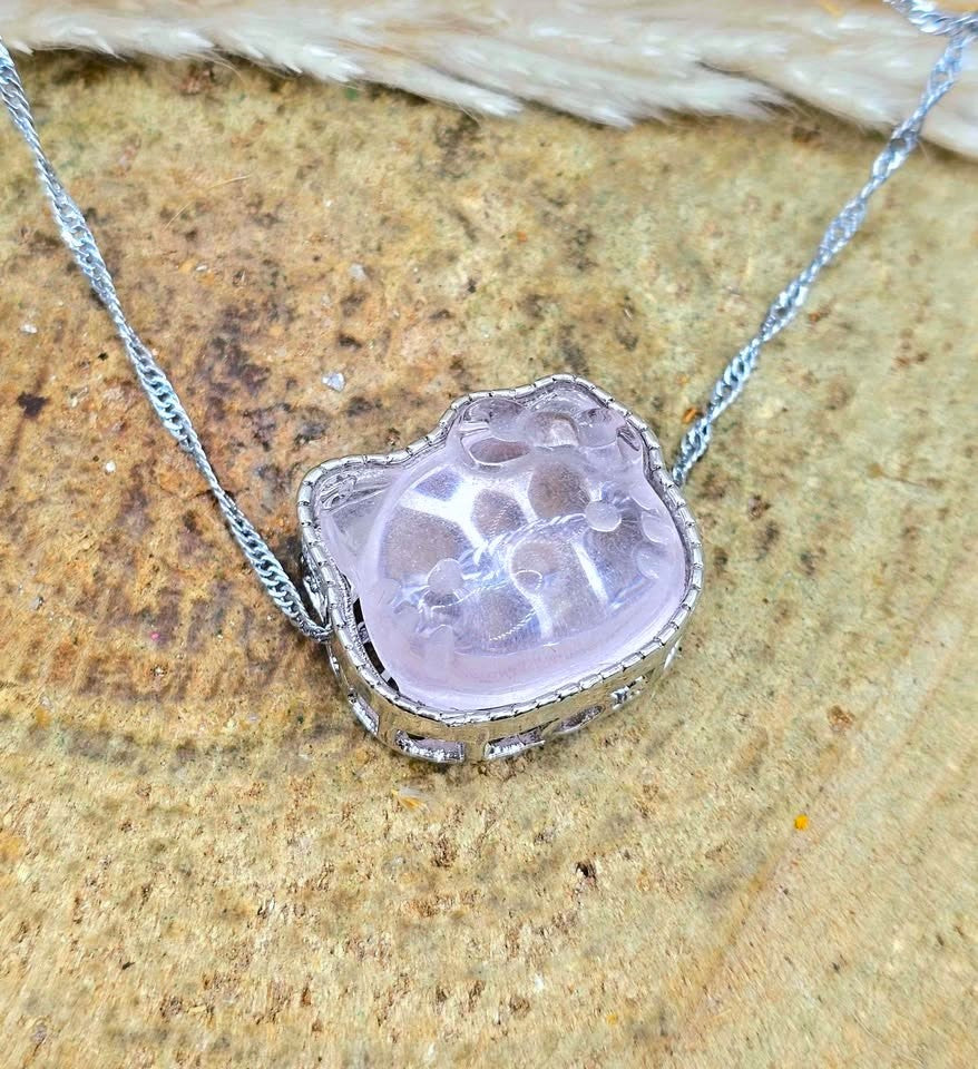 Natural rose quartz rose Hello Kitty charm with light pink transparent crystal and silver‑tone frame-My Aura Gemstones