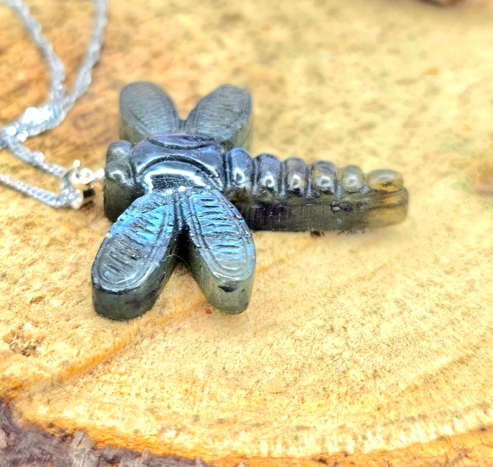 Natural labradorite craved  dragonfly-shaped pendant necklace with iridescent blue in front review at side top -My Aura Gemstones