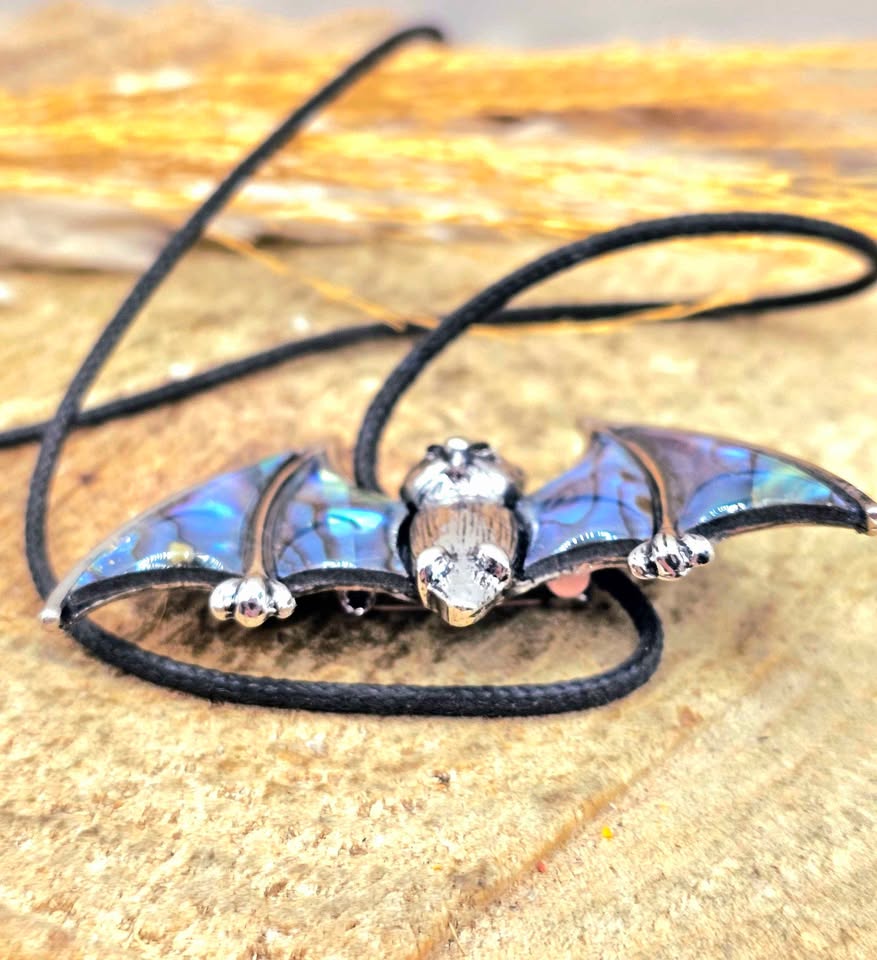 Flying bat abalone shell pendant necklace worn — My Aura Gemstones