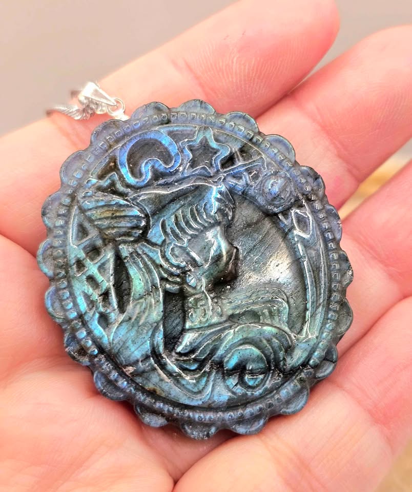 Natural labradorite pendant carved with Sailor Moon profile and crescent moon design — My Aura Gemstones