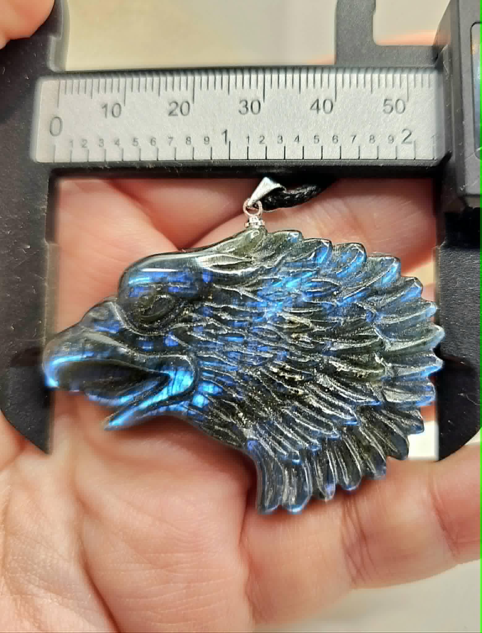Labradorite flashy eagle head pendant necklace lifestyle view — My Aura Gemstones