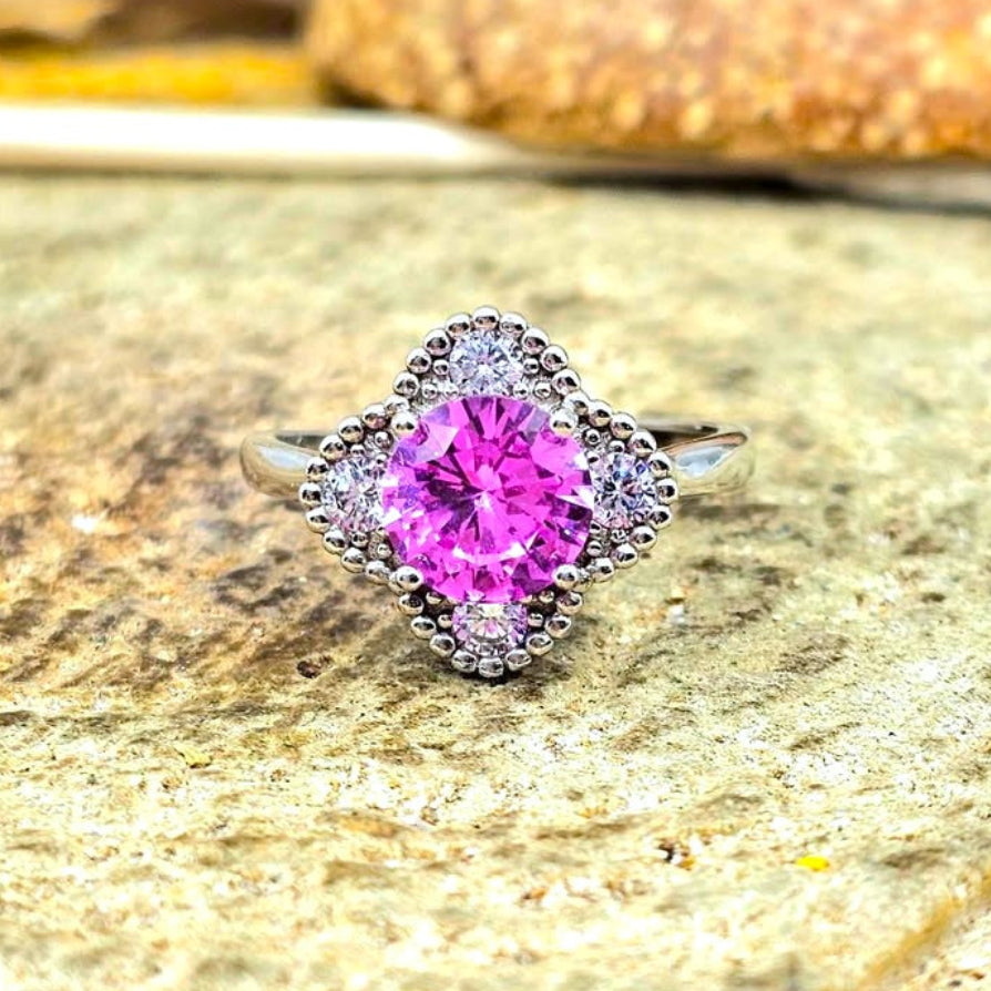 Pink Sapphire Faceted Ring Cocktail S925 Ring displays on wood slice-My Aura Gemstones