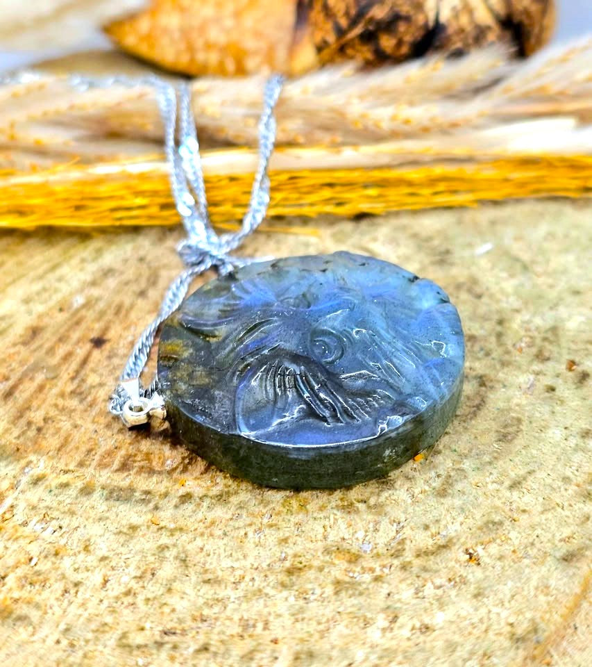 Carved cat face pendant detail — My Aura Gemstones