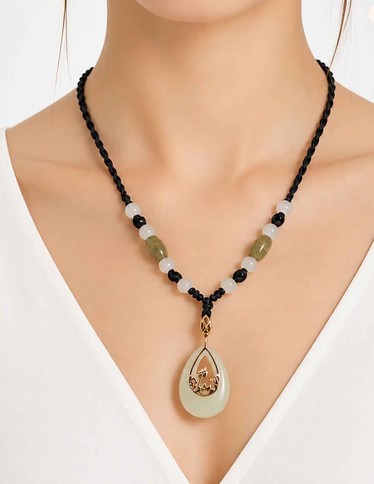 Natural jade teardrop pendant necklace, 10K rose gold lotus frame, photo 1 — My Aura Gemstones