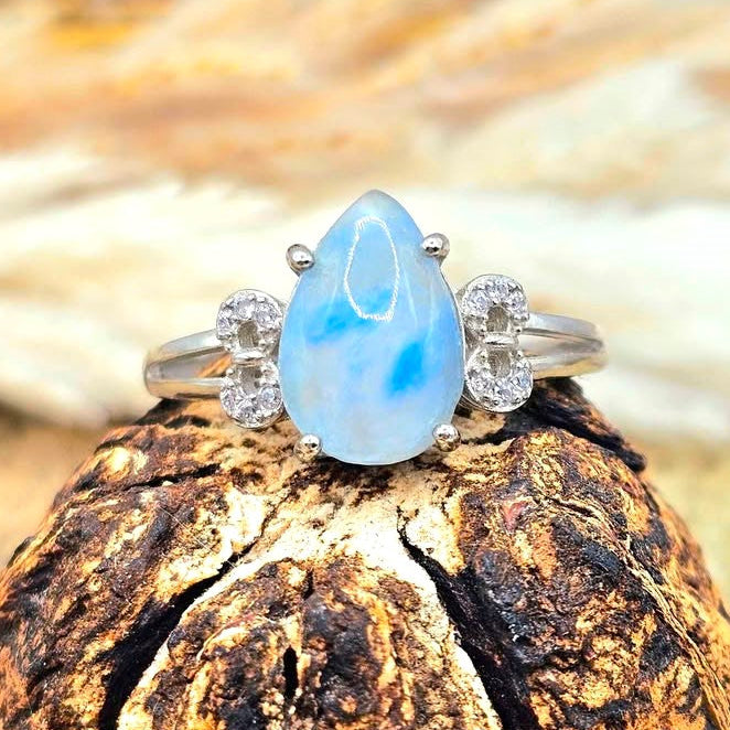Natural translucent blue kyanite teardrop ring with clear quartz mix and adjustable rhinestone‑stacked band. My Aura Gemstones