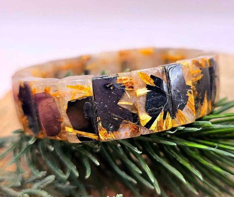 Gold rutilated quartz titanium rectangular beads bracelet stone close-up — My Aura Gemstones