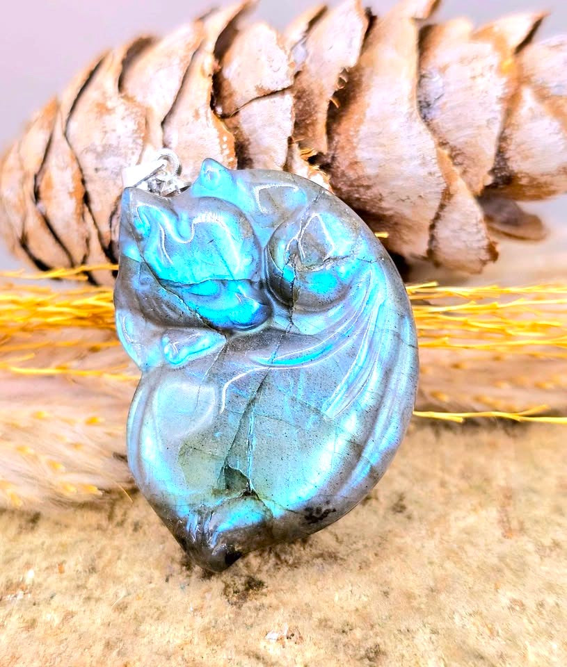 Natural Labradorite Carved Sleeping Fox Pendant Necklace Display On wood slice-My Aura Gemstones