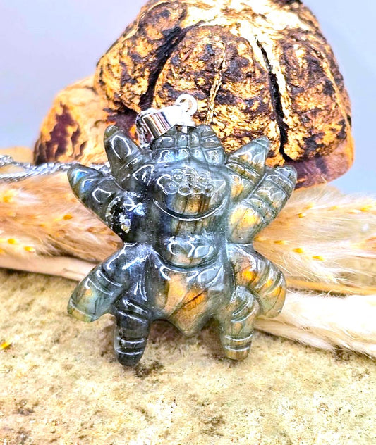 Natural Labradorite Spider Pendant Necklace Display on wood slice -My Sura Gemstones
