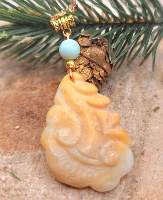 Orange quartz hand-carved Ruyi blessing pendant with rainbow stone — My Aura Gemstones