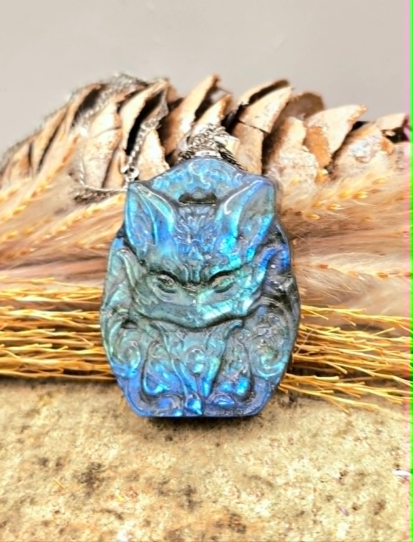 Labradorite carved sitting nine tails fox pendant necklace lifestyle view — My Aura Gemstones