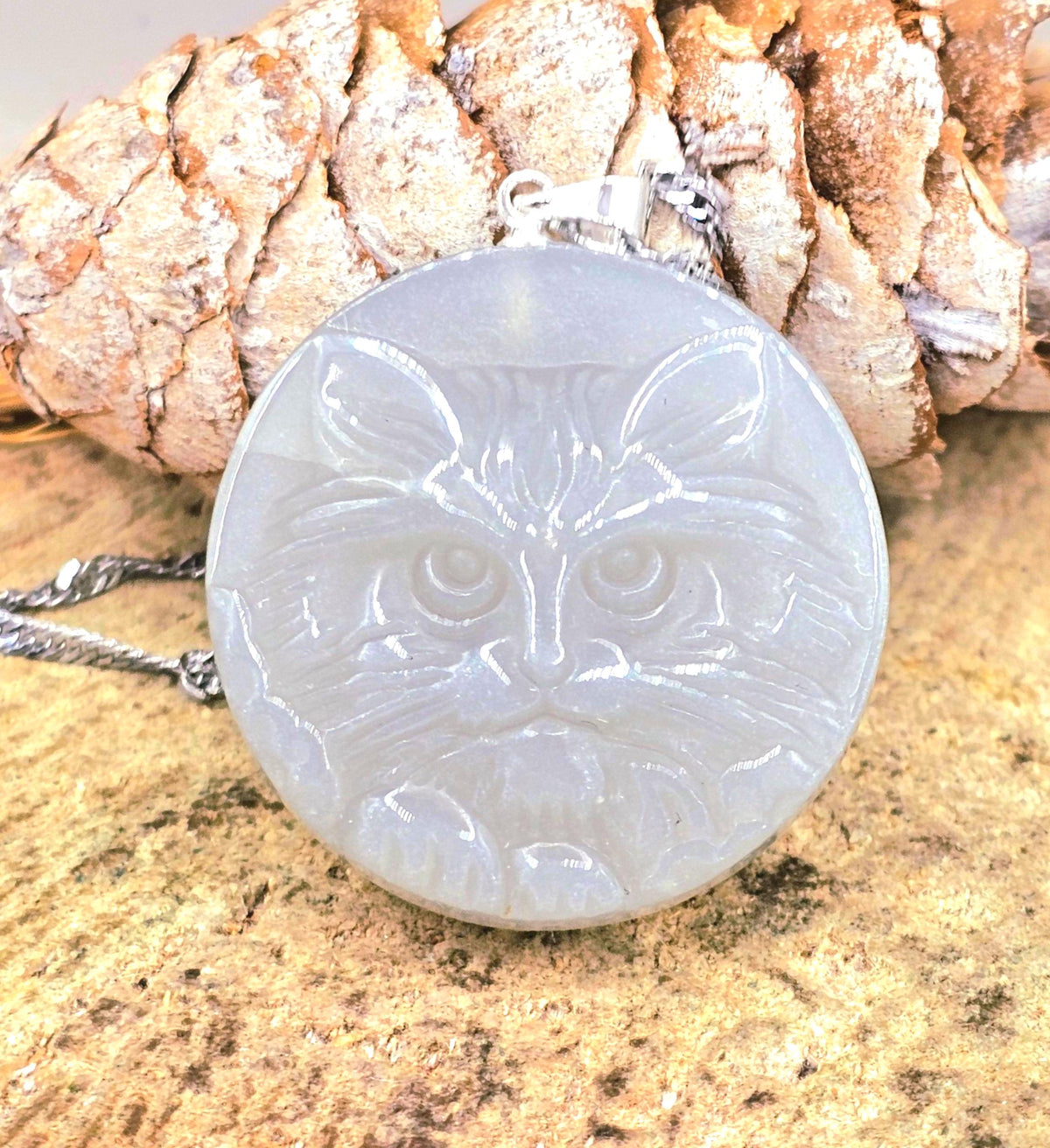 Stone carved cat face pendant in labradorite or moonstone with round crystal design — My Aura Gemstones